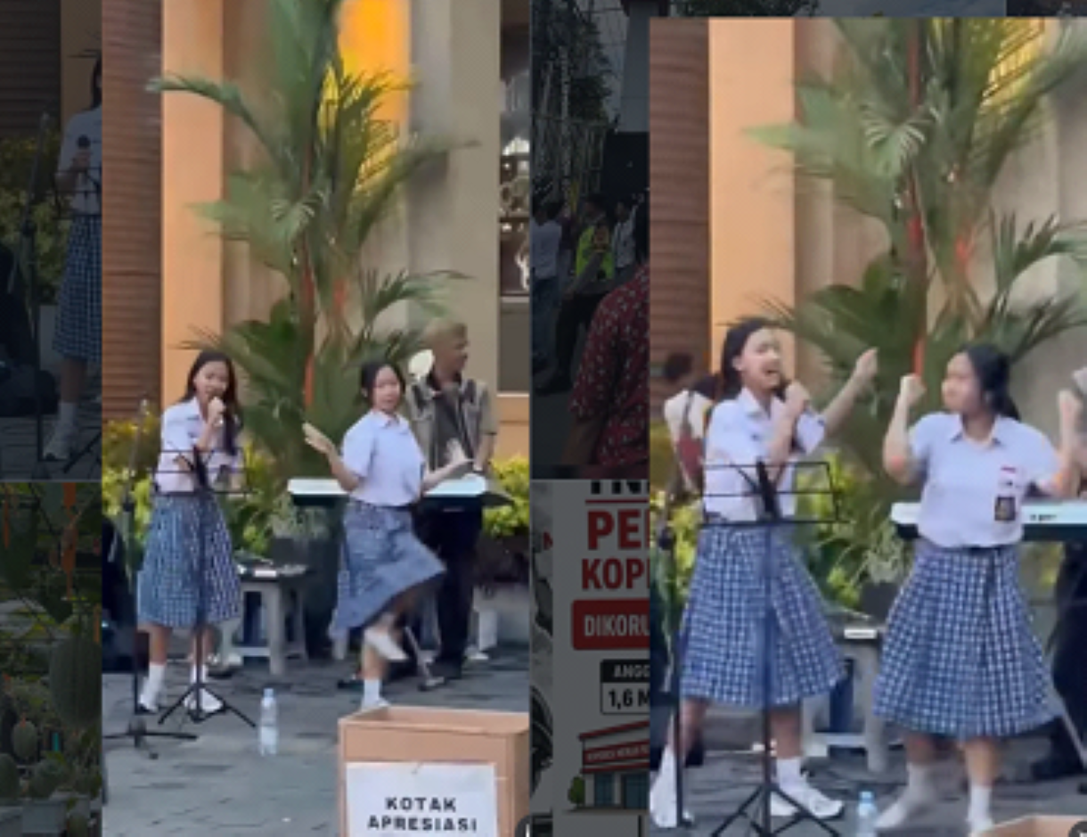Keren! Dua Siswa Berseragam Nyanyi Bersama Pengamen Jalanan di Malioboro